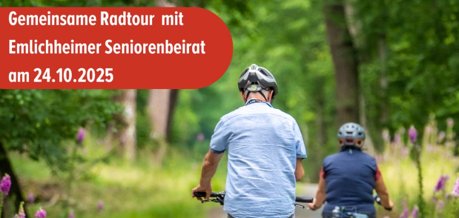 Zwei Radfahrer auf einem Schotterweg im Wald